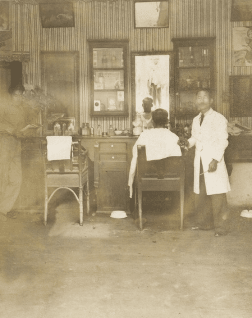 Early Japanese-owned barbershop in Peru. Photo sourced from Asociación Peruano Japonesa.